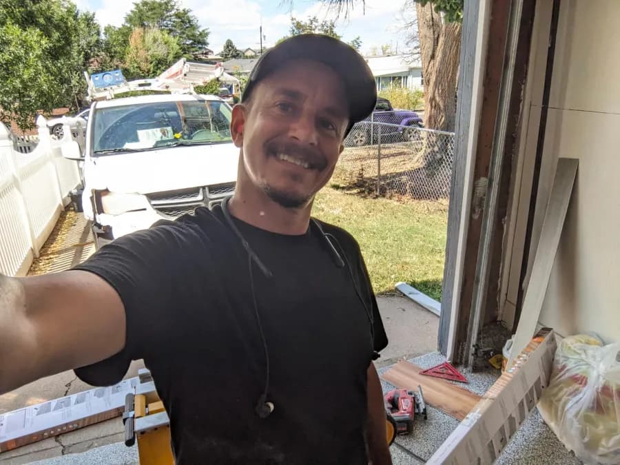 Zack, owner of Zack of All Trades, on a job site in Denver